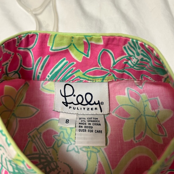 Lilly Pulitzer top. Tunic length. Side zipper. Snaps in front and button knots. - Picture 8 of 8